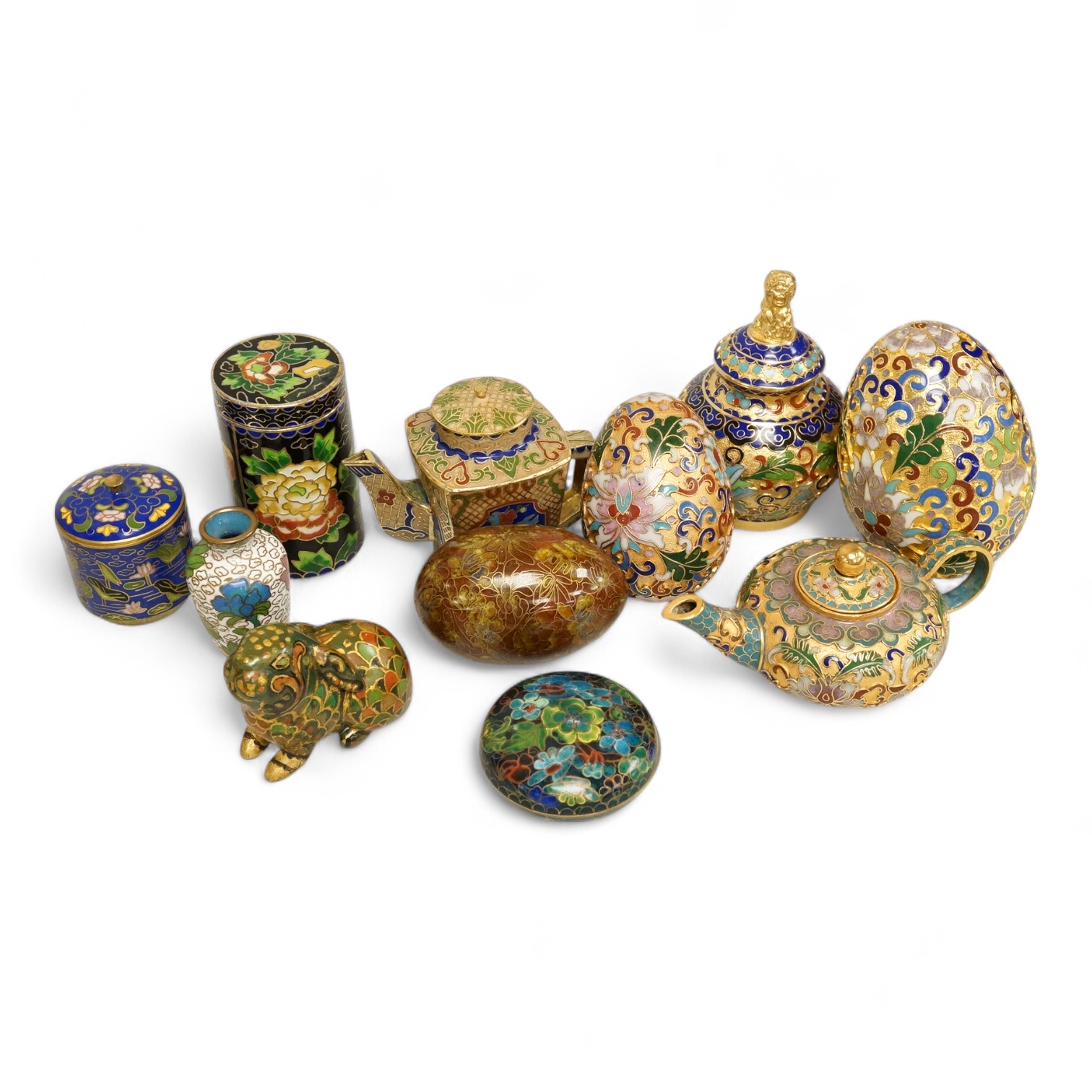 A collection of miniature enamel and cloisonné boxes, eggs and a painted rabbit, etc. (11)